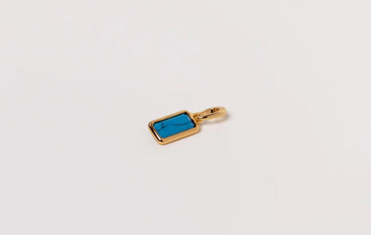 Turquoise December birthstone charm by Mogano — vibrant blue-green gemstone set in hypoallergenic gold filled or sterling silver casing