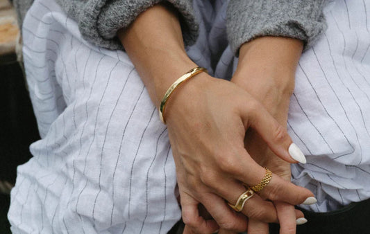 Best jewelry for everyday wear – Mogano hypoallergenic and water-resistant gold filled and sterling silver pieces including wave bangles, engravable charms, hoops, and tennis necklaces.