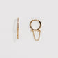 Gold hoop earrings with chain detail on a light gray background
